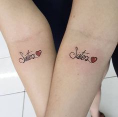 two people with matching tattoos on their arms that say sister and sister's day