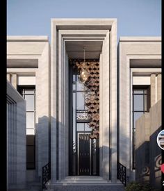 an entrance to a building with a chandelier hanging from it's side