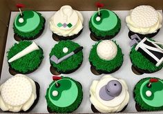 the cupcakes are decorated in green and white icing with golf related items on them