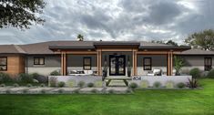 this is an artist's rendering of a modern ranch style home in the country