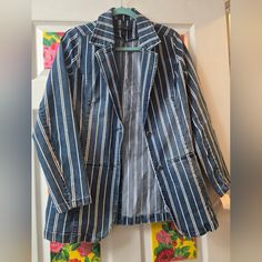 This Woman's Striped Blazer Jacket Is Perfect For Any Fashion-Forward Woman Looking To Add Some Style To Her Wardrobe. The Jacket Features A Classic Striped Pattern In Shades Of Blue, Making It A Great Choice For Any Occasion. It Is Made From High-Quality Materials And Is Designed To Last, Ensuring That You Get The Most Out Of Your Investment. The Jacket Is Available In Size Medium, Making It A Great Choice For Women Of All Shapes And Sizes. It Is Perfect For Wearing To Work Or For A Night Out O Casual Striped Outerwear For Work, Trendy Striped Blazer For Spring, Striped Button-up Outerwear With Pockets, Spring Striped Outerwear With Pockets, Casual Striped Blazer With Pockets, Womens Blazer, Woman Looking, Striped Blazer, Shades Of Blue