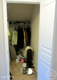 an open closet with clothes and other items