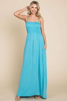 This smocked cami maxi dress is both stylish and functional, featuring convenient pockets for added practicality. The smocked bodice provides a flattering and comfortable fit for all body types. Perfect for a casual day out or a relaxing evening, this dress offers a versatile and effortless style. The cami straps add a Fall Outfits School, Culture Code, Turquoise Maxi Dress, Kitchen Fashion, Latest Casual Dress, Pastel Teal, Maxi Dress With Pockets, Relaxing Evening, Summer Fashions