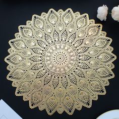 an image of a white doily on a black background with the measurements for it