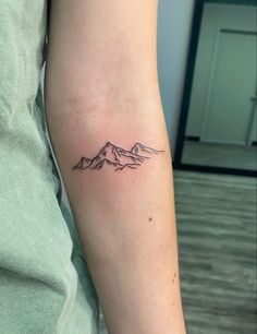 mountain tattoo minimal simple inner arm forearm Mountain Tattoo On Arm, Mountain Tattoo Ideas, Arm Tattoos For Women Forearm, Moutain Tattoos, Above Elbow Tattoo, Inner Elbow Tattoos, Simple Mountain Tattoo, Small Mountain Tattoo, Pnw Tattoo