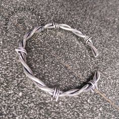 Our shop HandmadeJewelrybulk, Barbed Wire Bracelet Solid 925 Sterling Silver Barbed Wire Bangle Statement Bangle Barbed Wire Bangle Handmade Jewelry Gifts for Her You are welcome. The aim of our shop is to create new designs in jewellery and to create new items every day. We create beautiful jewellery for our shop every day. And we always seek the approval of our customers. We do not want any customer to go away disappointed from our shop. Hallmarked Metal Bangle Bracelet, Bracelet Fil Aluminium, Barbed Wire Bracelet, Unique Nickel-free Metal Bangle, Hand-wrapped Silver Braided Bangle Bracelet, Adjustable Nickel-free Metal Braided Bracelets, Birthday Events, Wire Bangles, Handmade Bangles