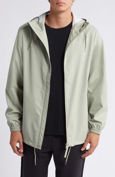 This lightweight, waterproof jacket with a longline silhouette keeps minimalism at the forefront as it keeps you dry. A hood with a built-in cap, an adjustable hemline and underarm eyelets bring comfort and breathability to the design that closes with a two-way, waterproof zipper. 30" length (size Medium) Hidden two-way front-zip closure Drawstring hood Long sleeves with elastic cuffs Unlined 100% polyester Machine wash, dry flat Imported Spring Waterproof Parka For Streetwear, Casual Weatherproof Windbreaker With Recycled Polyester, Modern Waterproof Raincoat For Spring, Casual Windbreaker With Drawstring Hood For Rainy Season, Casual Waterproof Recycled Polyester Outerwear, Casual Waterproof Outerwear In Recycled Polyester, Spring Windbreaker With Detachable Hood For Rainy Weather, Rainy Season Windbreaker With Detachable Hood, Spring Weatherproof Windbreaker In Solid Color