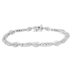 Four miracle set round cut diamonds connect with each other to create one of the links of this delicate tennis bracelet. Prong set round cut diamonds create an almond shaped cluster that alternates with the miracle set diamond chain to create this 1/2 a carat TDW sterling silver diamond bracelet that secures with a box with clasp mechanism. 'Video Available Upon Request.' Product Features: Diamond Type: Natural White Diamonds Diamond Count: 144 Round-Cut Diamonds Diamond Color: I-J Diamond Clari Silver Diamond Bracelet, Dragonfly Bracelet, Almond Shaped, Diamond Chain, Tennis Bracelet Diamond, Silver Pieces, Diamond Color, 2 Carat, Tennis Bracelet