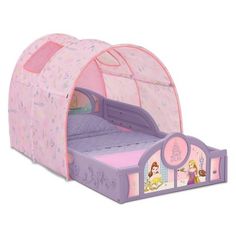 Every evening will be a royal occasion with this Disney Princess Sleep and Play Toddler Bed with Tent by Delta Children. The bed’s low mattress height, attached guardrails, cool tent with mesh windows and colorful graphics of the most-loved princesses make it the best option for your child's first big-kid bed—it gives them the independence they crave while keeping them safe throughout the night. And that's not all, the bed's versatile plastic frame can also be used as a play enclosure or a ton o Bed With Tent, Toddler Tent, Big Kid Bed, Disney With A Toddler, Princess Bed, Cool Tents, Toddler Beds, Bed Tent, Kids Dress Up