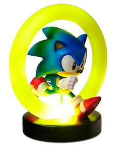 sonic the hedgehog figurine is lit up in yellow and blue colors with a green ring around it