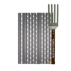 a fork that is sitting on top of a grill grate with holes in it