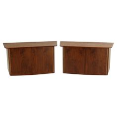 two wooden boxes sitting side by side on top of each other