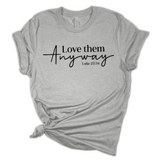 Show off your devotion to Christ in our collection of Christian t-shirts! This super comfy tee is made of 4.2 oz., 100% preshrunk cotton. CVC heather colors are a cotton/polyester blend. Double-needle stitched sleeve, and hem. Features a classic fit with taped neck and shoulders and a tear away label for maximum comfort and a perfect fit. We carry and ever-growing selection of apparel to suit the needs of the whole family. All of our tshirts are printed in-house by our professional production te Cricut Clothing, Christian Wear, Christian Outfits, Love Them Anyway, Ladies Design, Christian Tee Shirts, Bible Verse Tees, Circuit Ideas