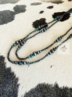 Our Extra Long Copper Patina Navajo Style Pearl beaded necklace is lightweight and adjustable. It comes with an extender and is adjustable from 60-63 inches. Wear it alone or layer it with your favorite punchy necklaces. Also available in silver or copper. This would make a great gift for the Western jewelry lover in your life!  Click here to be taken to our other necklaces: https://www.etsy.com/shop/CactusAndCoralInc?section_id=12164118 Click here to be taken to our Western chokers: https://www Hand-strung Turquoise Western Necklace, Southwestern Style Hand-strung Blue Beaded Necklaces, Southwestern Style Brown Hand-strung Necklace, Southwestern Adjustable Hand-strung Turquoise Necklace, Blue Nickel-free Southwestern Turquoise Necklace, Navajo Style, Santa Fe Style, Copper Patina, Extra Long