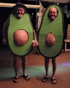 two men dressed as peales are standing next to each other