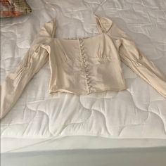 Long Sleeve Beige Blouse Never Worn! Super Cute With A Pair Of Jeans Or A Fitted Pant! Cropped Top For Going Out In Spring, Cream Tops For Spring Night Out, Spring Long Sleeve Tops For Going Out, Long Sleeve Tops For Going Out In Spring, Casual Long Sleeve Blouse For Going Out, Casual Button-up Top For Date Night, Trendy Blouse For Going Out In Spring, Beige Cropped Blouse For Day Out, Spring Night Out Cotton Blouse