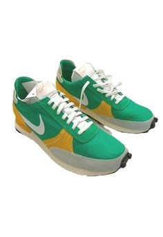 Retro Sports Sneakers With Logo, Nike Green Retro Sneakers, Retro Green Nike Sneakers, Green Leather Functional Sneakers, Green Mid-top Running Shoes With Rubber Sole, Green Fade-resistant Running Shoes For Streetwear, Green Fade-resistant Functional Sneakers, Functional Fade-resistant Yellow Sneakers, Rubber Shoes