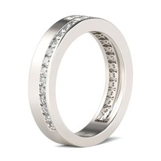 Celebrate your everlasting love story with this elegant band. Stunning as a wedding or anniversary band, it showcases a bypassing row of sparkling round stones set on a high polished shank. With grace and shimmer, this sparkling band is a classic style that complements her sophisticated taste. Carat Weight: 0.912 ctStone Size: 1.5 mmStone Type: Jeulia® StoneNumber of Stones: 32 Stone Color: Diamond WhiteStone Shape: RoundWeight: 4.57 gWidth: 3.42 mmThickness: 1.77 mmMaterial: 925 SilverPlating C Formal Diamond White Bands With Half Eternity Detail, Classic Cubic Zirconia Half Eternity Wedding Ring, Classic Half Eternity Cubic Zirconia Wedding Ring, Dazzling Half Eternity Band With Round Cut, Classic Cubic Zirconia Channel Set Diamond Ring, Classic Silver Eternity Band With Diamond Accents, Formal Diamond Half Eternity Band, Classic Bands With Diamond Accents And Cubic Zirconia, Formal Half Eternity Band