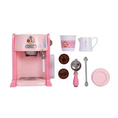 a pink toy coffee maker with accessories for making cupcakes and other things to drink