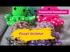 four crocheted octopus toys sitting next to each other