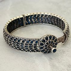 We bring beautiful Jewelry sure to elevate any look! Kindly pay attention to all photos and video and ask questions about the item prior to ordering. Sapphire Bangles Indian, South Temple, Temple Indian, Silver Kada, Sapphire Bangle, Deodorant Spray, Bracelet Bangle, Sapphire Blue, Pay Attention