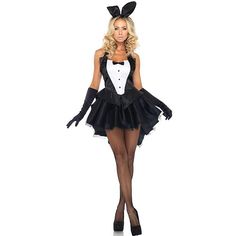 a woman in bunny costume is posing for the camera with her hands on her hips