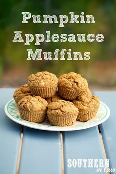 pumpkin applesauce muffins on a plate with the words, pumpkin applesauce muffins