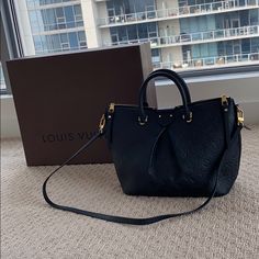 Authentic Louis Vuitton Bag, You Can Wear It Any Way You Want. Comes With Dust Bag And Box. Black On Black. Yellow Gold. Low Key Gorgeous Purse. Only Used Maybe 20x Max. Good Condition. Authentic Louis Vuitton Bags, Black On Black, Vuitton Bag, Low Key, Authentic Louis Vuitton, Louis Vuitton Bag, Louis Vuitton Monogram, Dust Bag, Top Handle Bag