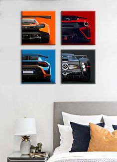 a bed with pillows and three pictures on the wall above it, including a sports car