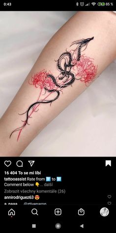 a woman's arm with a tattoo on it