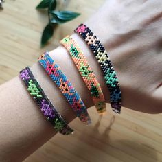 These pixel art alien bracelets are sure to add some colour and fun to your days 👾 These beautiful and super colorful bracelets feature high quality Miyuki glass beads and silver/Gold plated metal finishings. 🌈 Each bracelet is one of a kind, handbeaded by me. The length of each bracelet is approximatively 17cm, but I can make them longer by adding more metal rings at the end upon request. Send me a message for any questions! 😊 Alien Bracelets, Handmade Rainbow Braided Friendship Bracelets, Handmade Trendy Rainbow Braided Bracelets, Trendy Handmade Rainbow Braided Bracelets, Handmade Rainbow Jewelry For Friendship, Multicolor Braided Jubilee Friendship Bracelets, Multicolor Jubilee Friendship Bracelets, Trendy Handmade Rainbow Friendship Bracelets, Rainbow Tiny Beads Friendship Bracelets