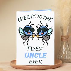 a greeting card featuring two bees with sunglasses saying cheers to the flyest uncle ever