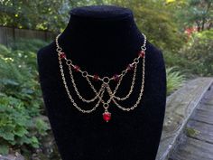 "* Handmade by me. 🫶🏼 *  Red Fantasy Choker ❤️ * Nickel-free * .25\" Heart Pendant * Beaded  * 12\" chain - adjustable up to 15\" Fairycore/cottagecore/coquette/fantasy jewelry/fairytale/gold fairycore/red witchcore/red fairycore/fairy/red fairy/renaissance jewelry/cosplay jewelry/red cottagecore" Red Beaded Chain Necklace Gift, Red Beaded Chain Necklace For Gift, Gift Red Beaded Chain Necklace, Red Beaded Chain Necklace For Valentine's Day, Red Heart-shaped Chain Necklace, Red Metal Jewelry With Beaded Chain, Red Metal Chain Necklace As Gift, Fantasy Choker, Red Cottagecore