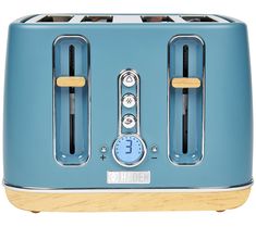 a blue toaster sitting on top of a wooden table