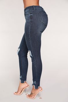 Available In Dark Denim Repreve Fabric - Made From Recycled Materials Mid Rise Stretch Denim Ankle Destruction 27" Inseam Disclaimer: Due To The Specialized Wash & Distressing Process. Each Garment Is Unique 71% Cotton. 27% Repreve. 2% Spandex Imported Dark Wash Distressed Denim Jeans, Distressed Dark Wash Denim Jeans, Mid-rise Denim Jeggings With Frayed Hem, Trendy Denim Jeggings With Frayed Hem, Ripped Dark Wash Denim Bottoms, High Rise Ripped Denim Jeggings, Curve Jeans, Ribbed Mini Dress, Womens Loungewear