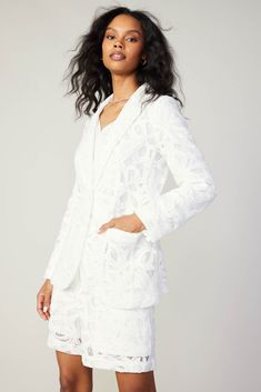 This white lace blazer features delicately sheer construction, offering a glimpse of what's underneath. It's cut for a smart, single-breasted silhouette and accented by slightly puffed shoulders. Notched lapels, tonal buttons, and flap pockets are classic tailored details, but the look is fresh and feminine. Pair it with our matching lace shorts for coordinated statement . •Notched lapels •Button closures •Flap pockets •Long sleeves •Vented back hem•Classic fit •Sheer Item number 2320117 100% Po Single Breasted Blazer, Lace Blazer, Print Trends, Vacation Dresses, Breasted Blazer, White Blazer, Sweater Sale, Short Jumpsuit, Sweater Blouse