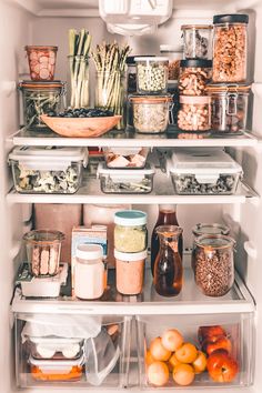 an open refrigerator filled with lots of food