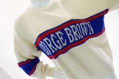 "Vintage George Brown pullover crew neck sweater. George Brown College is located in Toronto, Canada. Red / blue design on a cream background. Care tag was snipped out; knit feels like acrylic. Estimated era: 1980s.  Good vintage condition overall, however there are several small stains as shown. Sweater has been cleaned but not intensively spot cleaned.   Size tag is absent. It measures like a men's XL, but to help ensure a good fit for you, please go by the following approximate measurements, Vintage Varsity Sweater, Cream Crew Neck Sweater With Graphic Print, Cream Graphic Print Crew Neck Sweater, Retro Crew Neck Cream Sweater, Retro Cream Crew Neck Sweater, Brown College, College Sweater, Vintage Varsity, Female Mannequin