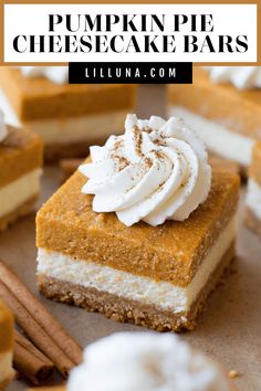 pumpkin pie cheesecake bars with whipped cream on top and cinnamon sticks in the background