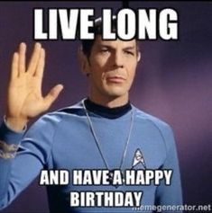 a man in a blue shirt holding his hand up with the words live long and have a happy birthday