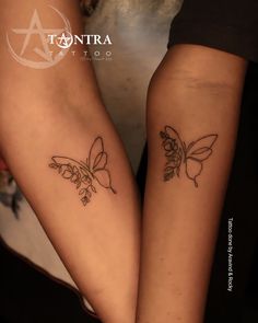 two tattoos on both legs with flowers and butterflies