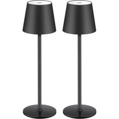 two black lamps are next to each other on a white background and one is turned off