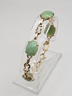 Vintage Ornate 14k Yellow Gold Jade Panel Bracelet  Item w #1438 - Clean and in good condition  - Marked 14k - 7.25 inches long with a spring ring clasp - Safety chain - Each Jade is approx 15mm Long and 12mm Wide -13.8 grams Welcome to Westgate Jewels!! We specialize in vintage estate, designer, and fine jewelry. Our shop consists of items that are estate, antique, and / or vintage conditions unless otherwise noted. This means that most items are prior owned and may have some imperfections such Gold And Green Jewelry, Green And Gold Jewelry, 12th Wedding Anniversary, Jade Charm, Bethlehem Pa, Bracelets With Meaning, Vintage Silver Rings, Everyday Bracelet, Green Jewelry