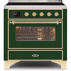 a green oven with gold trimmings on the front