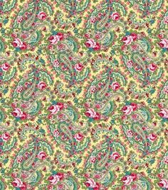 a green and pink paisley print fabric with red, blue, yellow and white flowers