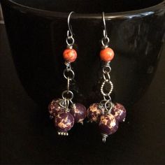 These Handcrafted One Of A Kind Earrings Are Made With Purple Impression Jasper Rounds And Orange Howlite Rounds On Fish Hook Ear Wires. Ear Wires Are Nickel Free. Earrings Measure 2”. Designed And Handcrafted By Me Boho Bohemian Gypsy Witchy Hippie Hippy Festival Summer Gemstone Spring Vacation Jewelry Earrings Artisan Adjustable Purple Earrings, Unique Purple Earrings With Ear Wire, Purple Wire Wrapped Beaded Earrings For Gift, Adjustable Wire Wrapped Purple Beaded Earrings, Adjustable Purple Wire Wrapped Beaded Earrings, Purple Dangle Beaded Earrings Wire Wrapped, Purple Wire Wrapped Drop Beaded Earrings, Purple Wire Wrapped Beaded Dangle Earrings, Purple Wire Wrapped Dangle Beaded Earrings