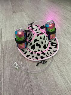 "**Be sure to check out my new website linked on my page or by going to www.howdy.company! A fun, neon style, cowboy hat with cup holders for two cans and a straw. Each hat is made to order to match your color preferences for both the Iights and the hat itself. The Iights give the hat a cool mix between futuristic and western looks. I love seeing all of the different color combinations people come up with. My personal favorites are the pink Iights with the pink hat or the aqua Iights with the wh Fun Adjustable Mini Hats For Rodeo, Fun Carnival Costume Hats And Headpieces, Country Style Summer Costume Hats For Rodeo, Country Style Costume Hats And Headpieces For Summer Rodeo, Western Mini Hats For Summer Rodeo, Western Mini Hats For Summer Country Events, Adjustable Fun Hat For Western-themed Events, Western Style Mini Hats For Summer Country Events, Western Style Hat Bands For Summer Parties