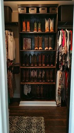 the closet is full of shoes and clothes