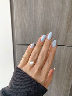 Oval Light Blue Nails, Snowy Blue Nails, Rounded Almond Acrylic Nails, Baby Blue Dip Nails, Blue Oval Acrylic Nails, Simple Baby Blue Nails, Almond Nails Baby Blue, Baby Blue Nails Short, Powder Dip Nail Ideas