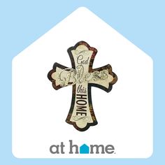 a cross with the words god is his home on it